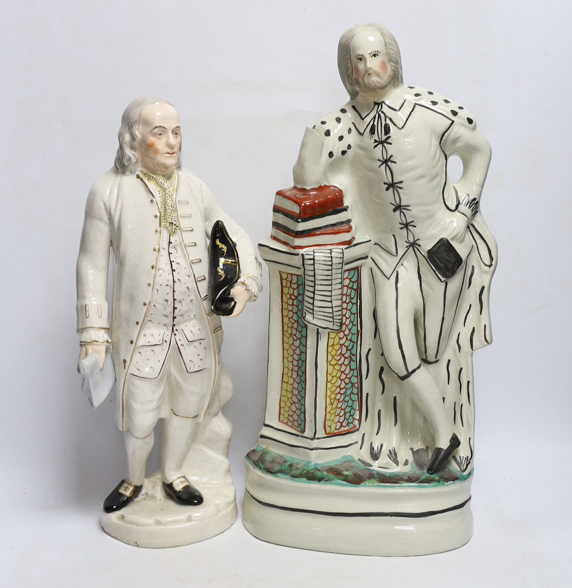 A Staffordshire pottery figure of Benjamin Franklin, modelled holding the Bill of Rights and a Staffordshire style pottery figure of William Shakespeare, tallest 46cm